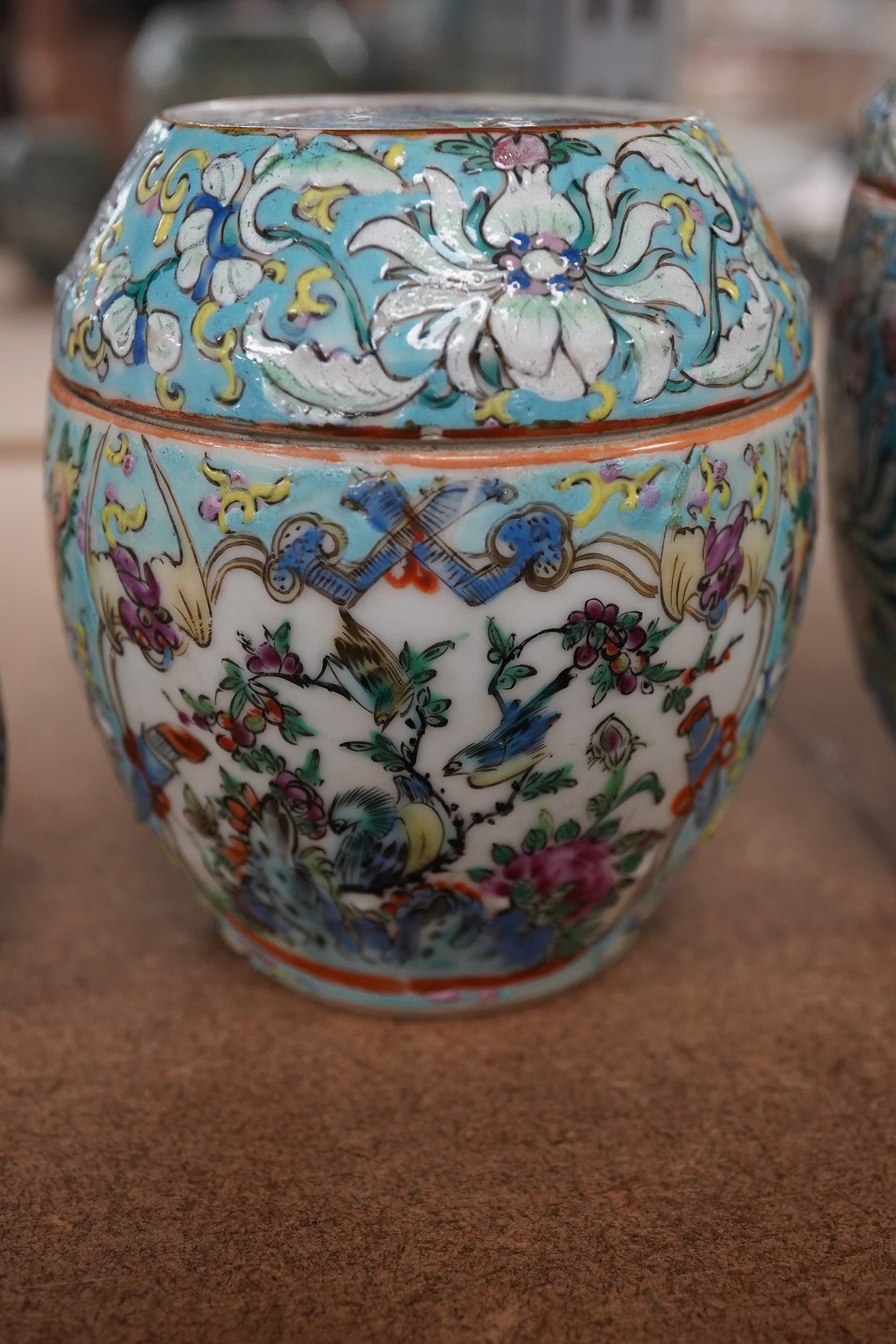 A complete Chinese porcelain nest of five enamelled porcelain barrel shaped boxes, c.1900, largest 12cm high. Condition - fair, some minor chipping